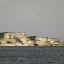Pohled na maják a nejjižnější část ostrova - Capo Pertusato.